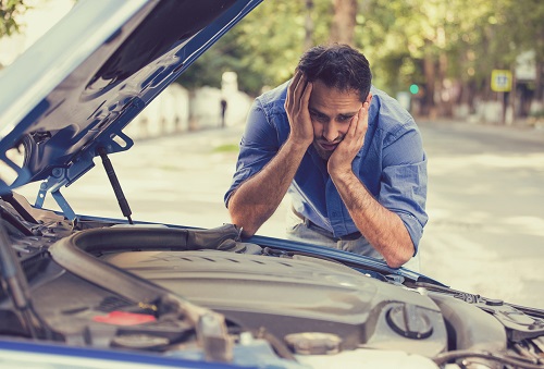 Man despairing over car